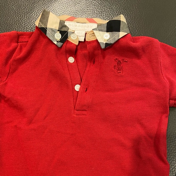 Red Burberry polo. Size 9 months. New never worn.
